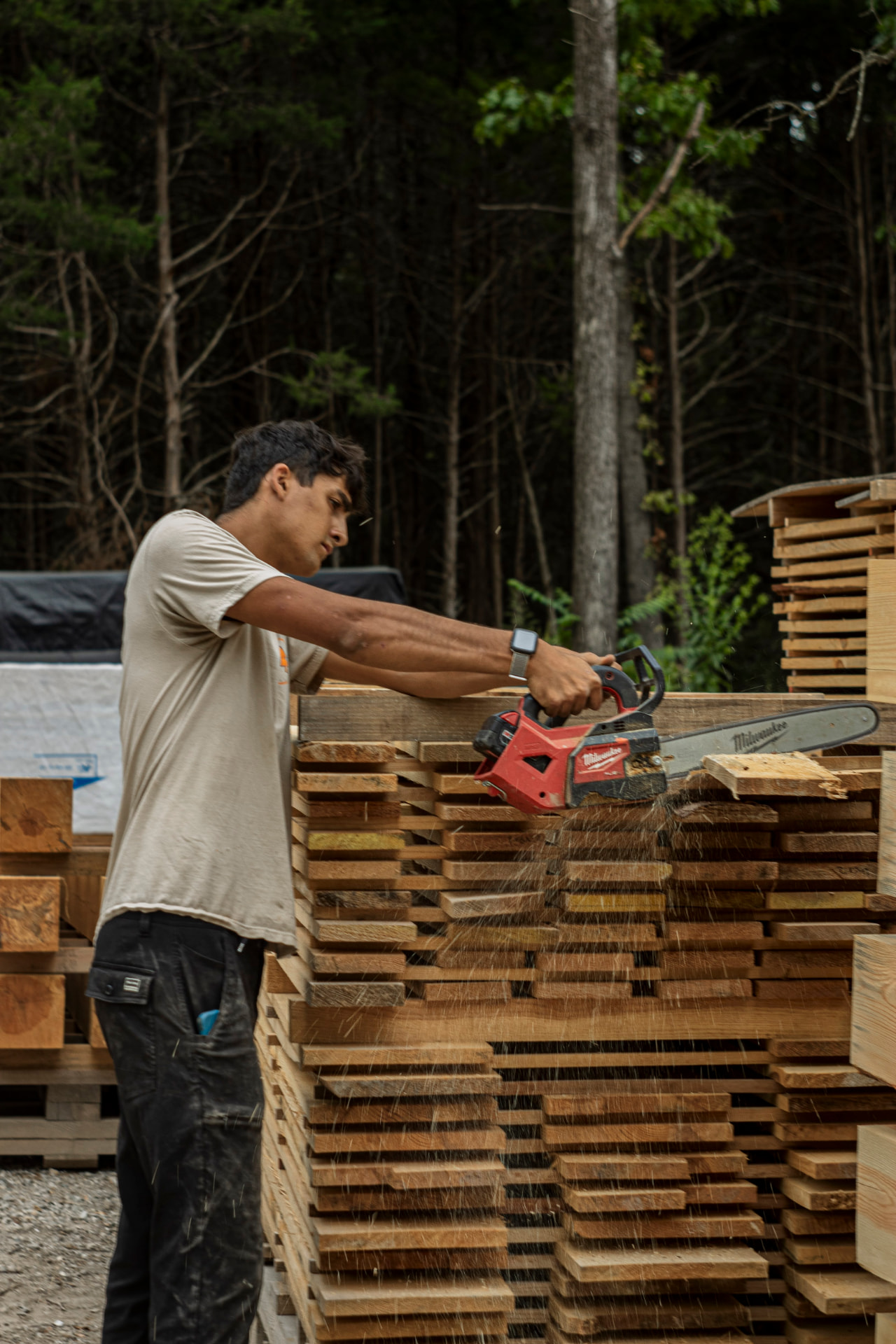 Lead Sawyer Zacc trimming some boards
